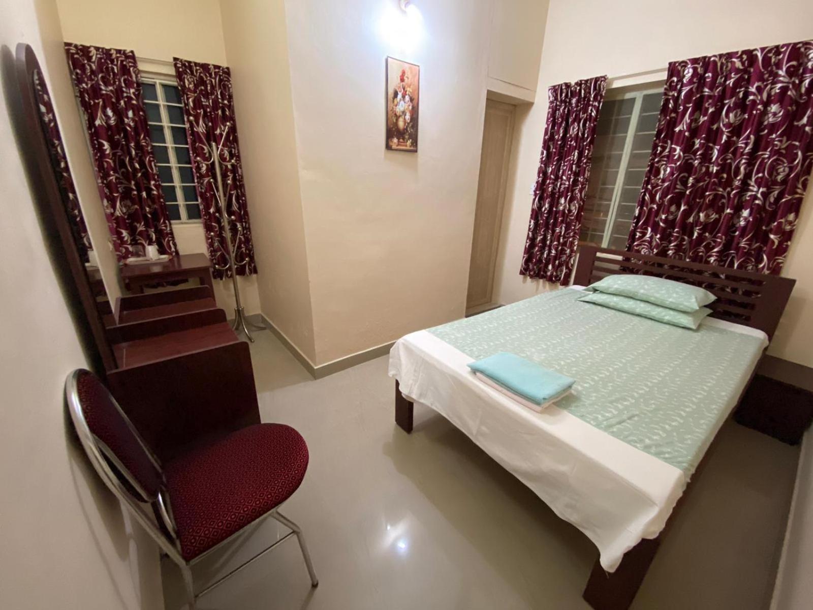 Gloria Homestay Kochi Værelse billede